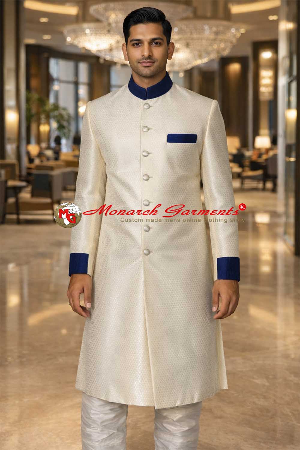 Ivory brocade sherwani for men with navy blue bandhgala collar and cuffs by Monarch Garments India