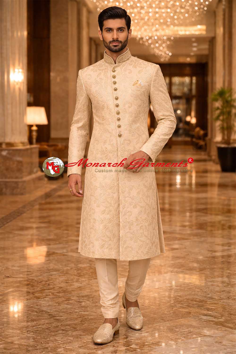 Indian groom wearing ivory dupion silk wedding sherwani with floral woven pattern by Monarch Garments