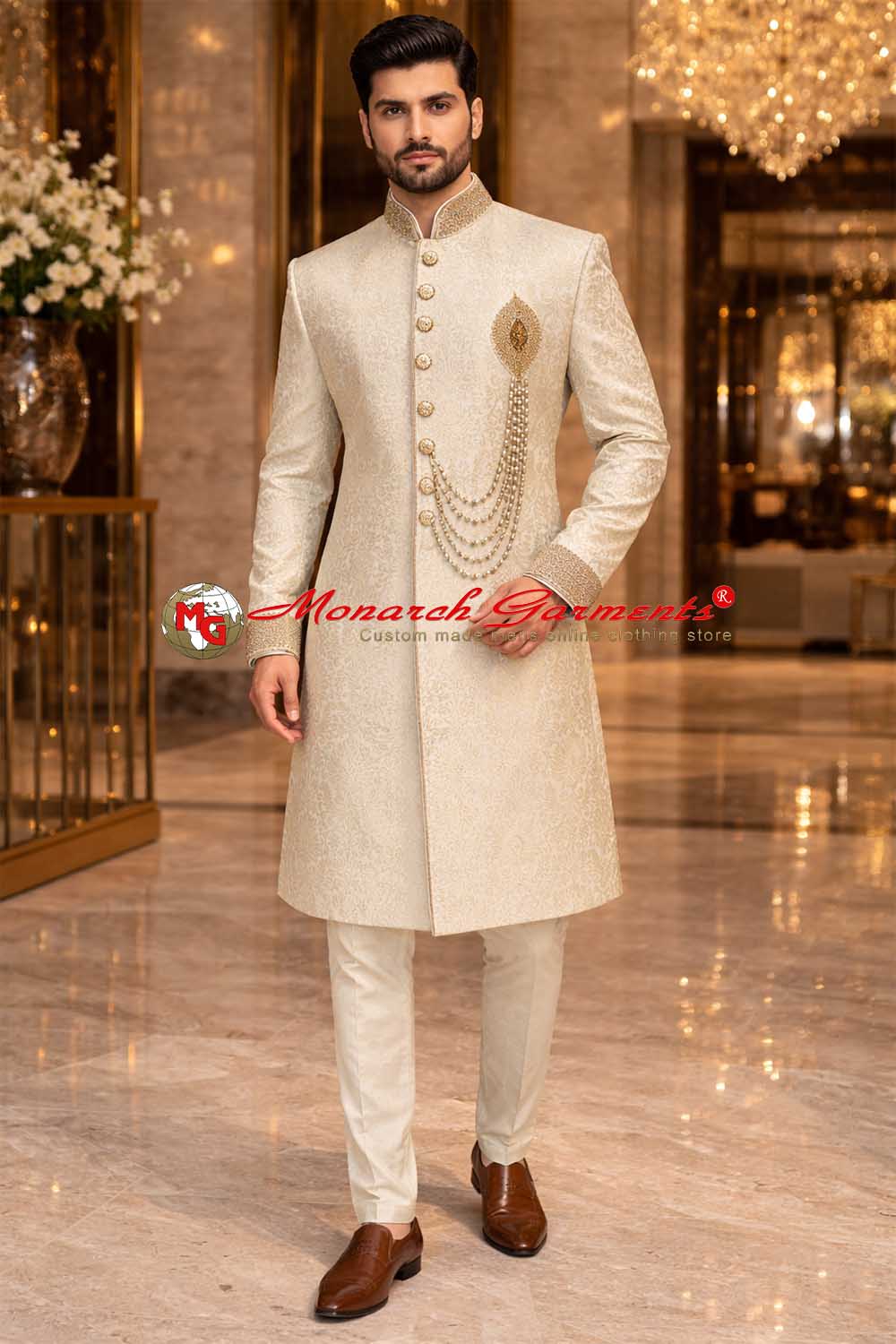 Ivory dupion silk wedding sherwani with pearl brooch chain for Indian groom by Monarch Garments