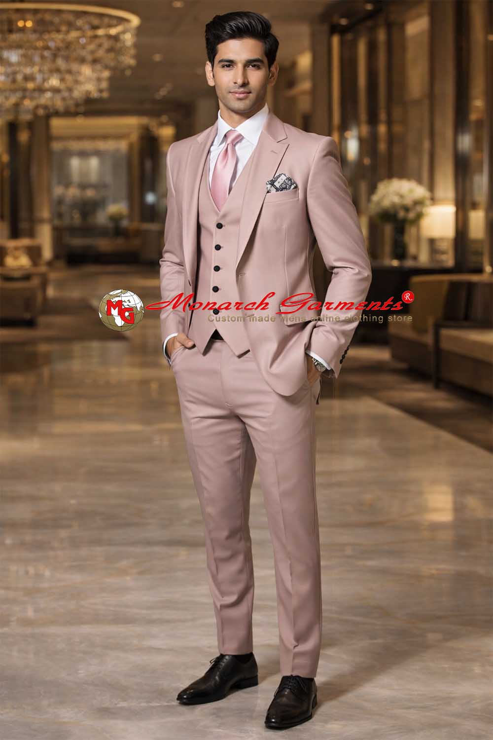 Light pink 3 piece wedding suit for men with peak lapel and tailored fit in premium wool