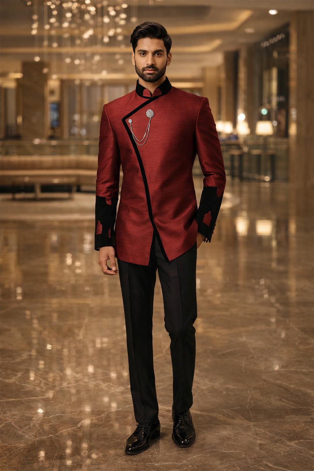 Men’s maroon dupion 3-piece Jodhpuri suit with concealed buttons, black velvet trim, brooch and black trousers