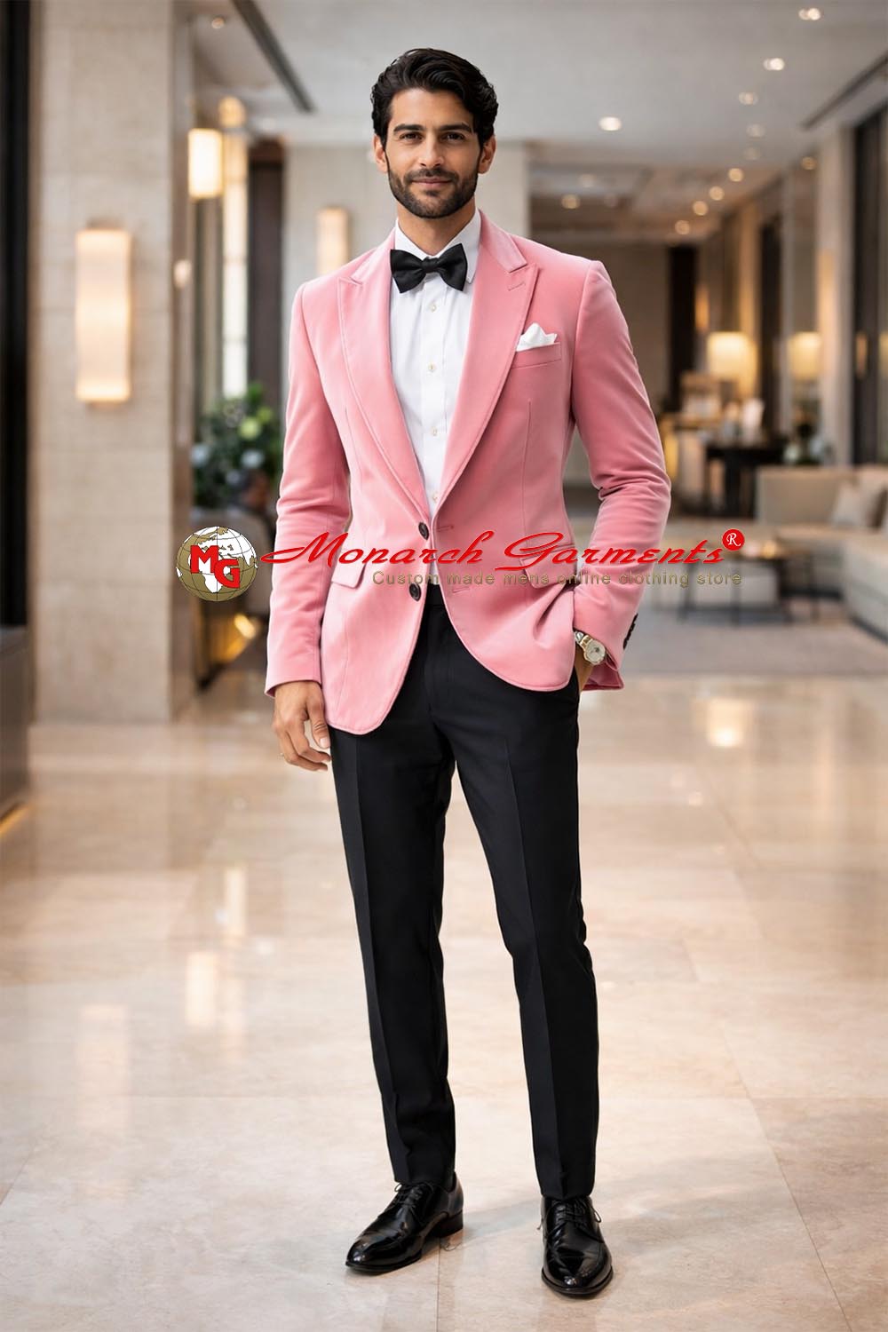 Men wearing pink velvet tuxedo jacket with bow tie for wedding and gala events in India