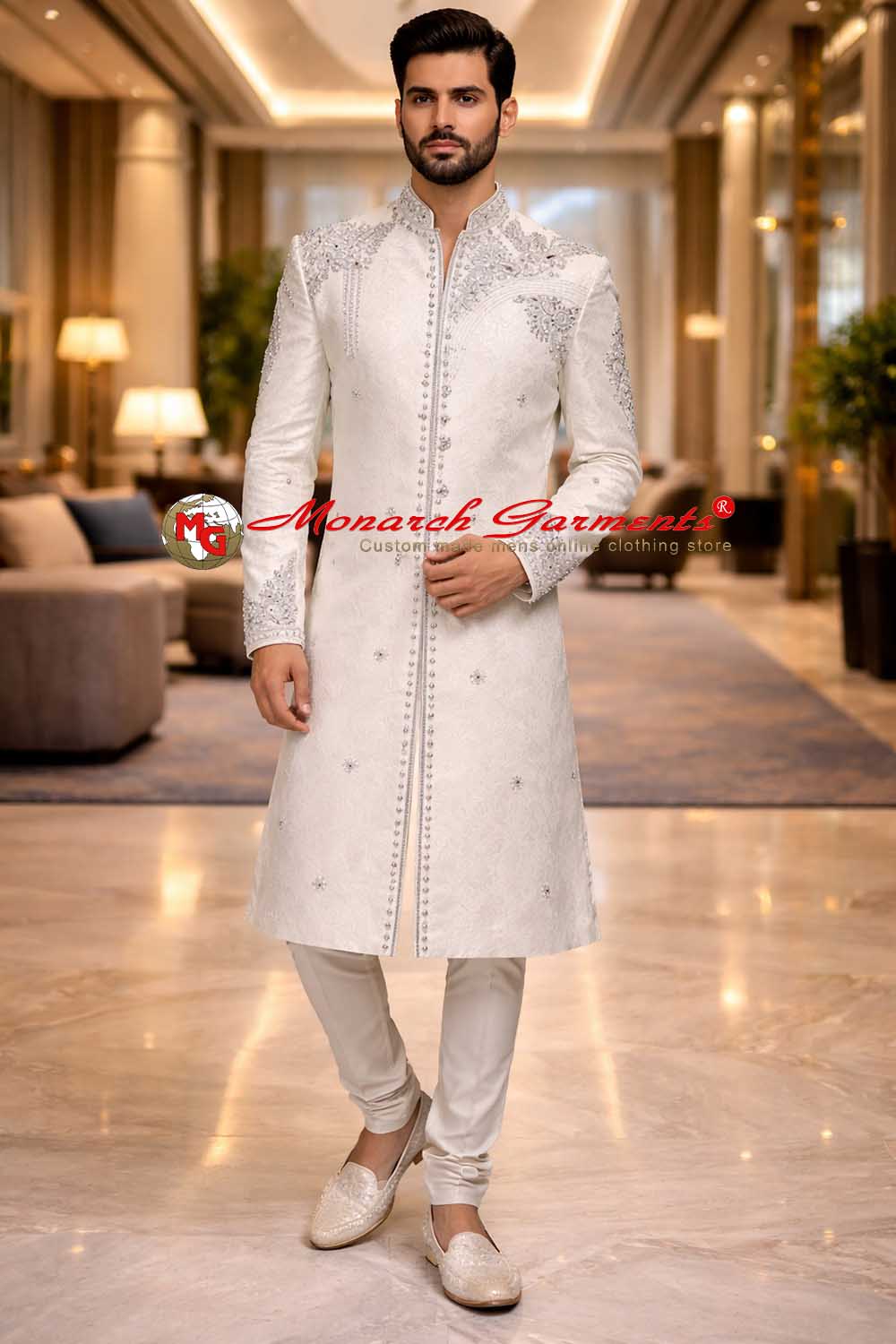 White brocade embroidered wedding sherwani for men with black churidar pyjama by Monarch Garments