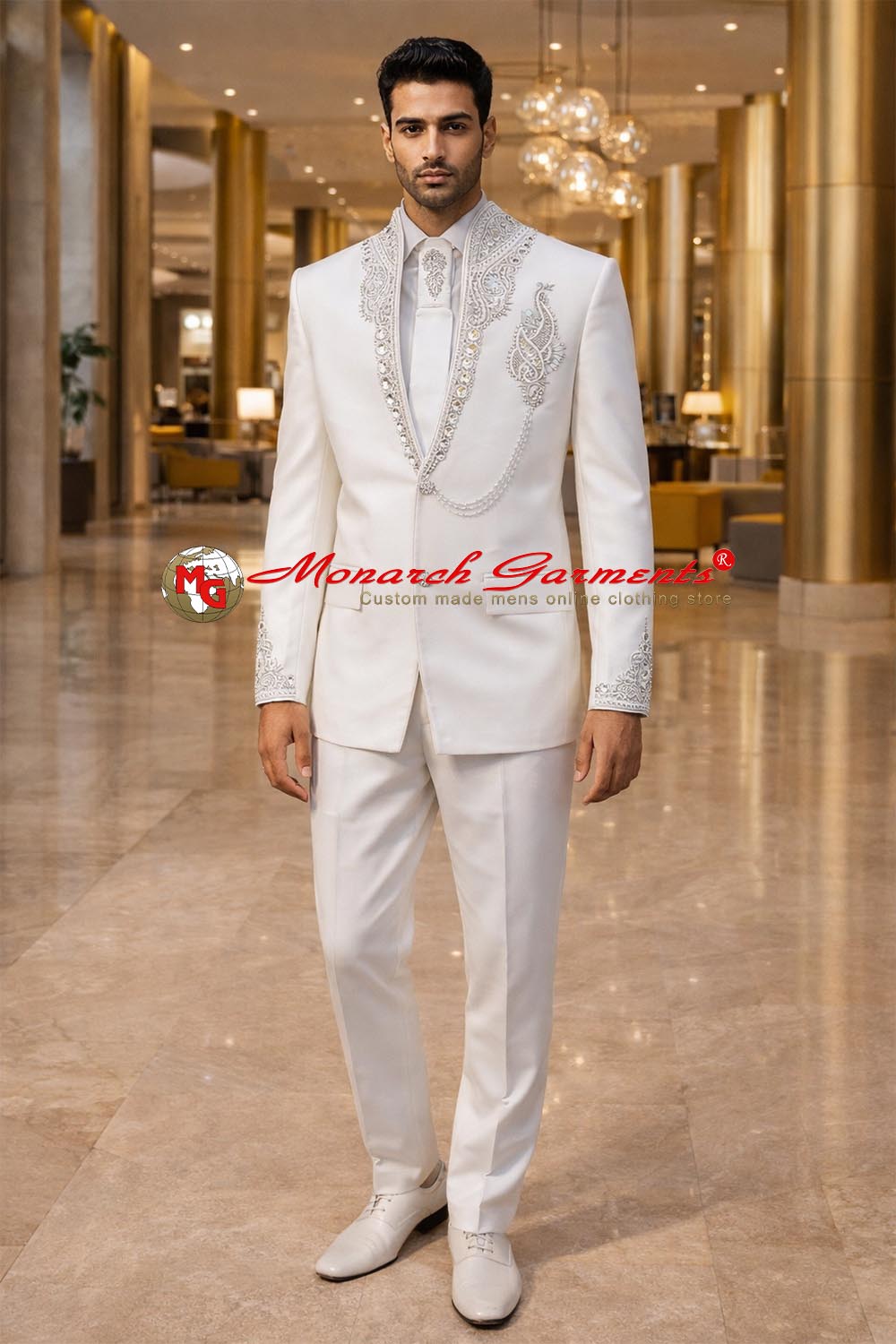 White designer embroidered Jodhpuri bandhgala suit for men with shirt and tie, luxury groom wedding outfit by Monarch Garments