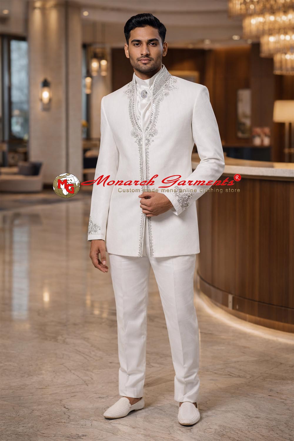 White hand embroidered Jodhpuri bandhgala suit for men with scarf and brooch, luxury groom wedding outfit by Monarch Garments